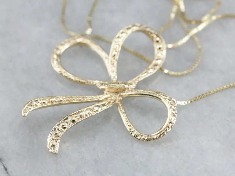 Ladies rings price range-Yellow Gold Bow Conversion Necklace