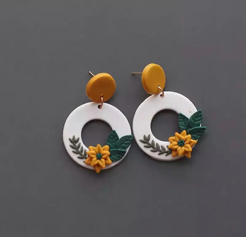 Ladies earrings sale offers-Hollow Floral Polymer Clay Earrings