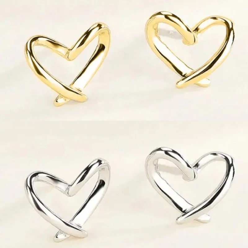 Ladies earrings white gold-Beautiful Silver or Gold Twisted Heart Stud Earrings