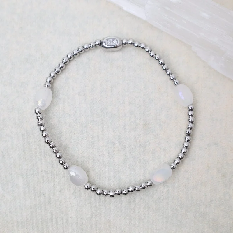 Ladies bracelets silver tones-Here & There Pop Of Color Bracelet in White Cap & Stainless Steel