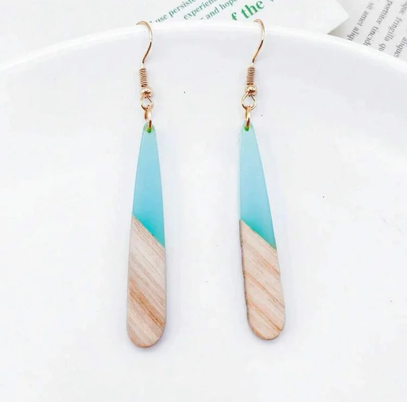 Ladies earrings care tips-Gorgeous Wood and Light Blue Resin Bar Earrings